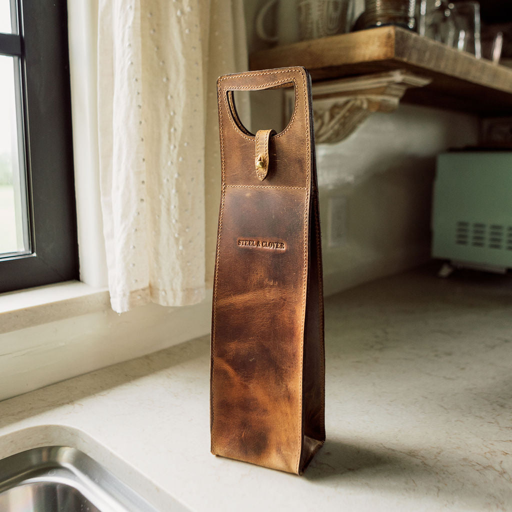 Baytree Leather Wine Carrier made from premium leather, designed to hold and carry a wine bottle in a stylish and protective case