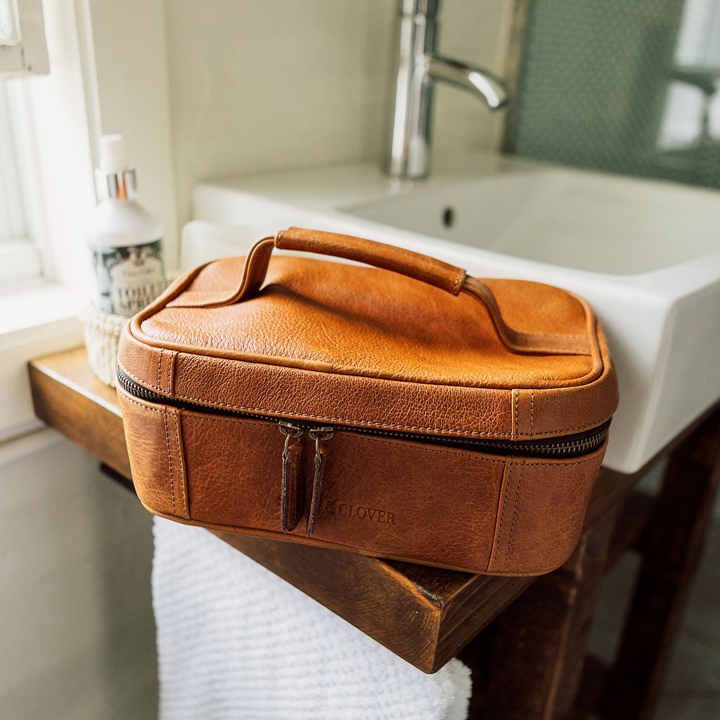 Calais Leather Toiletry Bag made from premium leather, designed for stylish and organized storage of travel toiletries