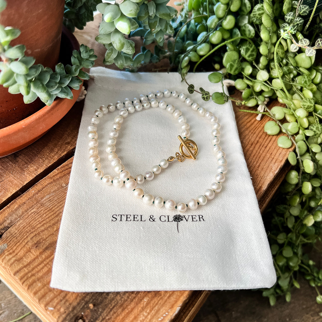 Kakwa Freshwater Pearl Necklace featuring natural freshwater pearls in a delicate, elegant design for timeless everyday wear