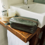 Reno Dopp Kit made from durable premium material with a compact, organized design for storing travel toiletries and grooming essentials