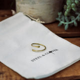 Smoky River Brass Ring made from polished brass with a minimal, nature-inspired design for everyday wear and stacking