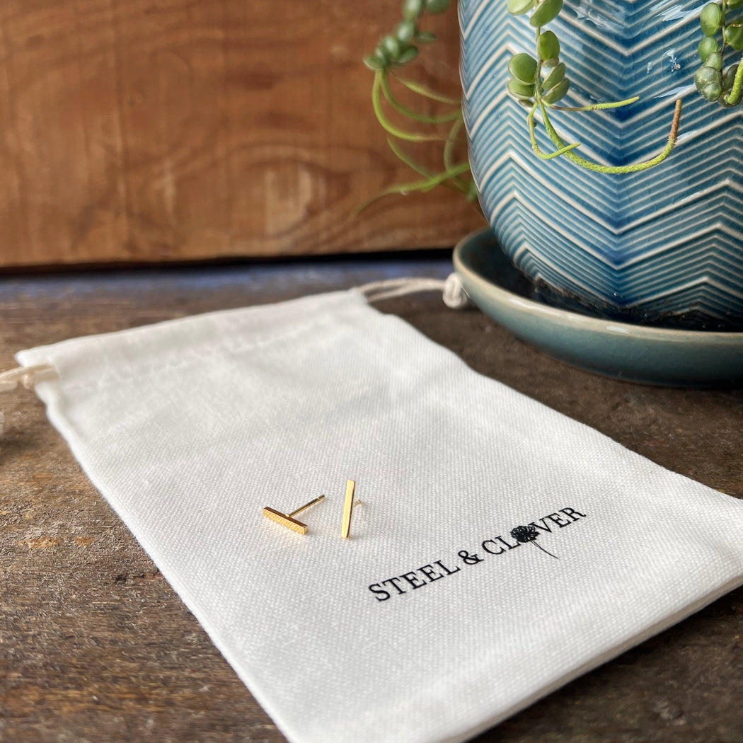 Mini Bar Stud Earrings with a slim, minimal bar-shaped design in a polished finish for subtle, modern everyday wear